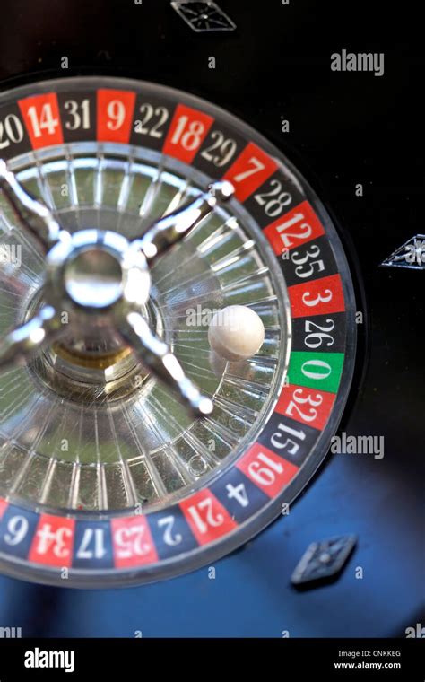 Roulette game table and game chips Stock Photo - Alamy