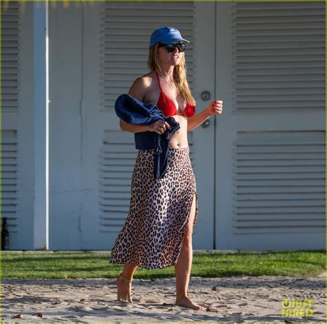 Alice Eve Wraps Up Summer In A Red Bikini During Barbados Beach