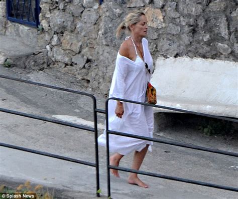 How Old Is She Again Sharon Stone Flaunts Her Curves In White Bikini PHOTOS YNaija