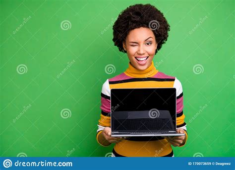 Portrait Of Positive Afro American Girl Hold Netbook Show Touch Screen