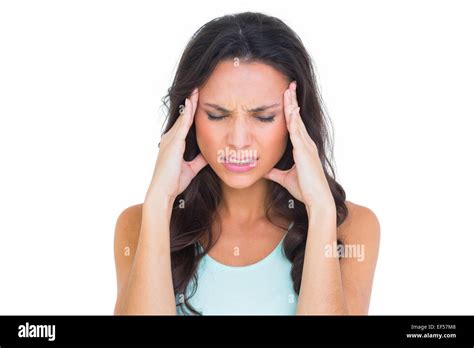 Pretty Brunette Getting A Headache Stock Photo Alamy