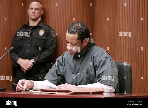 Accused Sniper John Allen Muhammad Listens To The Judge In The