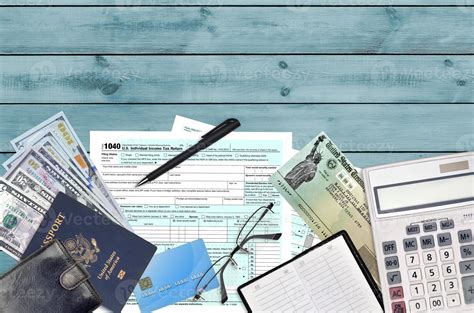 IRS form 1040 U.S. Individual income tax return with refund check lies