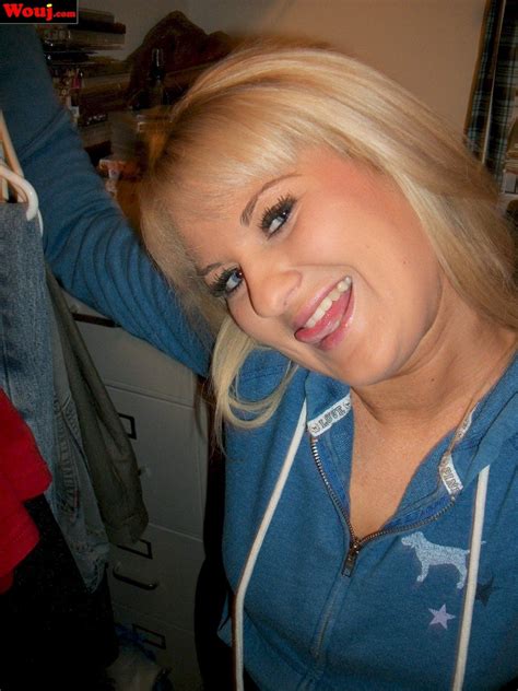 Brunette Hottie Showing Off Her Nice Ass In Booty Shorts Photos