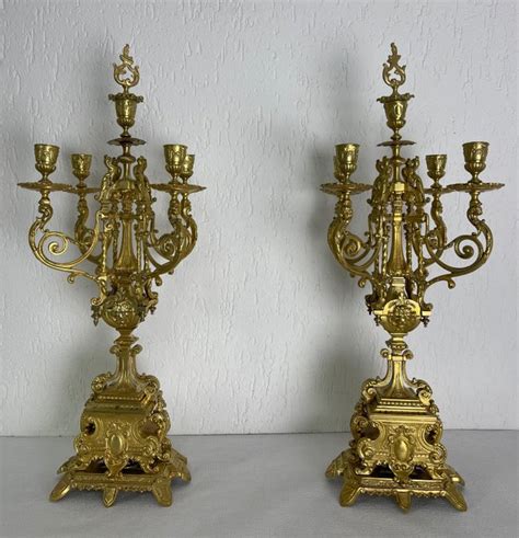 Pareja De Candelabros De Bronce Con Extintor Cinco Brazos Catawiki