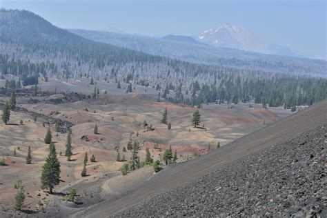 Cinder Cone, The Painted Dunes, and a smoky Mount Lassen in the ...