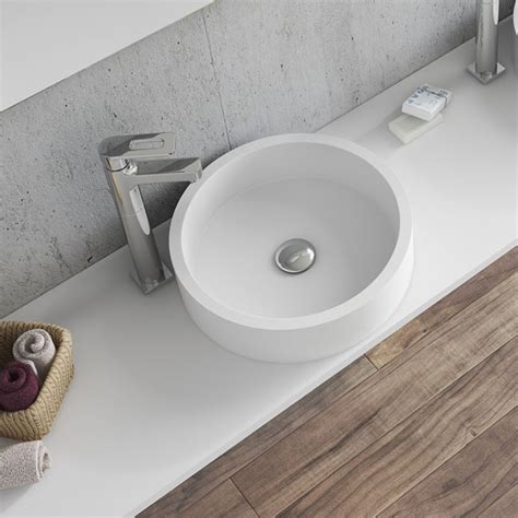 lavabo de solid surface sobre encimera coso de  solid