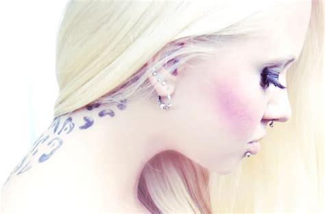 Beautiful Blonde With Piercing Stock Photo NinaMalyna