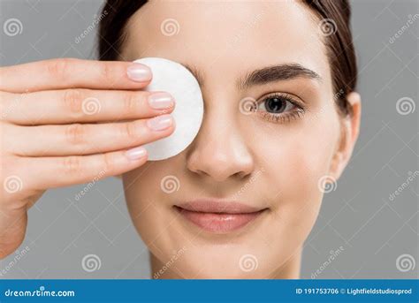 Close Up Of Cheerful Naked Woman Covering Eye With Cotton Pad Stock Photo Cartoondealer