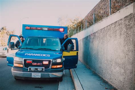 Paramedics Going Inside an Ambulance · Free Stock Photo