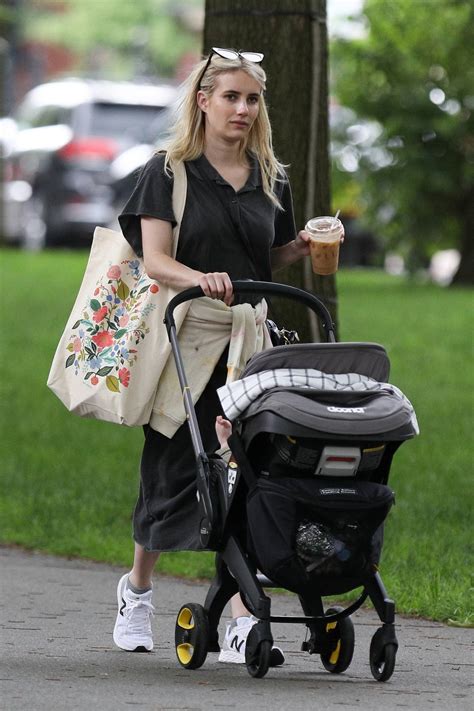 Emma Roberts Enjoys An Iced Coffee While Out On A Morning Walk With Her