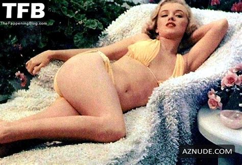 Marilyn Monroe Sexy Poses Showing Off Her Hot Figure Wearing A Yellow Bikini In A Photoshoot