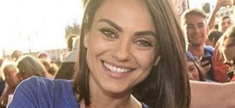 Mila Kunis Lifts Shirt In Skimpy Bikini On A Balcony