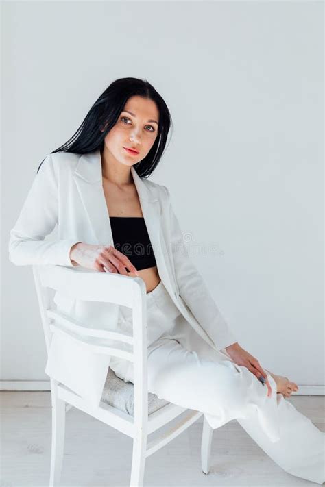 Fashionable Brunette Woman Sitting On An Old Chair Stock Photo Image Of Fashion Female