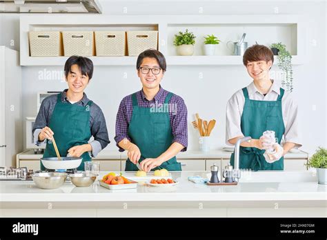 Japanese Men Cooking Stock Photo Alamy