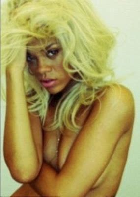 Rihanna Poses Topless To Promote Her New Fragrance Nude