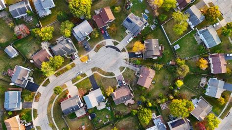 Aerial View Of Suburban Neighborhood In Autumn A Vibrant Aerial