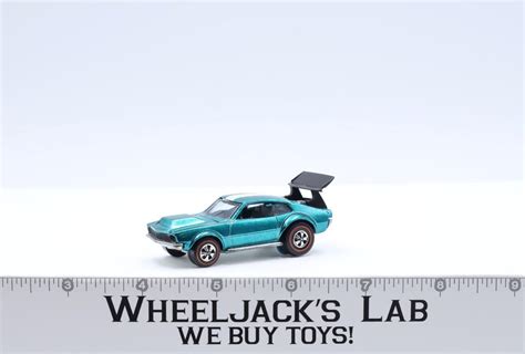 Mighty Maverick Aqua Mattel Redline Hot Wheels Vintage Rl W Button Wing Wheeljack S Lab