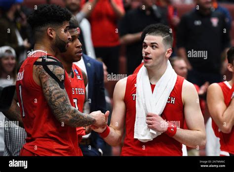 ANAHEIM, CA - MARCH 28: Texas Tech guard Matt Mooney (13) and Texas ...