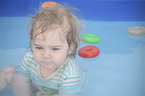 Water Games Blonde Boy Having Fun In The Pool Stock Photo Image Of Carefree Blond 309052010