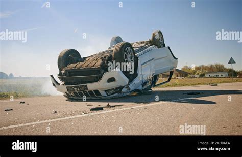 Horrific Traffic Accident Rollover Smoking And Burning Vehicle Lying On