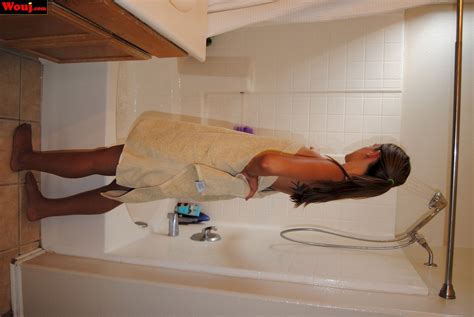 Pretty Brunette Chick Posing In Her Cute Pink Outfit In The Bedroom Photos