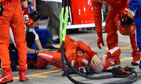 WATCH Kimi Raikkonen HITS Ferrari Mechanic During Botched Pit Stop