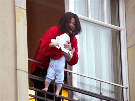 Mother dangles baby out of window by wrists in ‘Michael Jackson’ moment