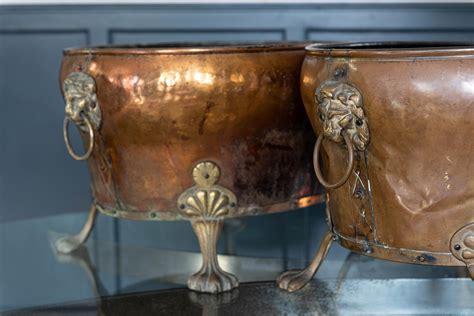 Pair Of English Late 19th Century Copper And Brass Lion Paw Coal