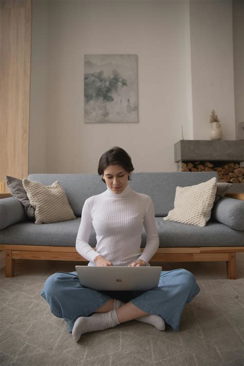 Photo Of Woman Sitting On Floor · Free Stock Photo
