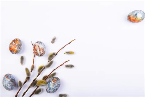 Premium Photo Easter Background Flat Lay With Branches Pussy Willows And Colorful Painted Eggs