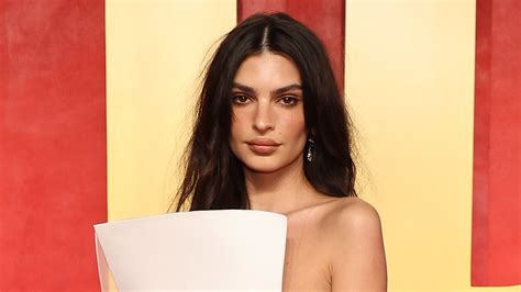 Emily Ratajkowski Suffers A Wardrobe Malfunction In A Daring Backless