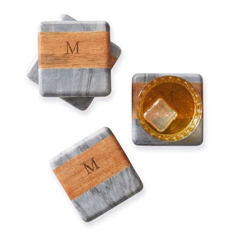 marble and wood coasters with monogrammed initials