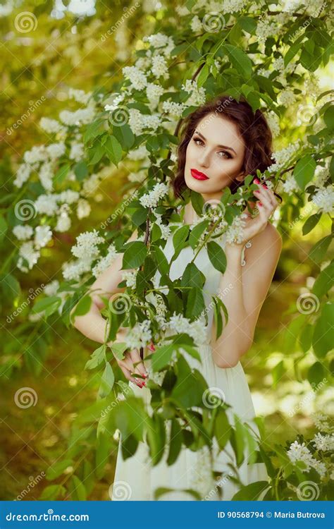 The Portrait Of This Gentle Sensual And Brunette Girl With Stock Photo