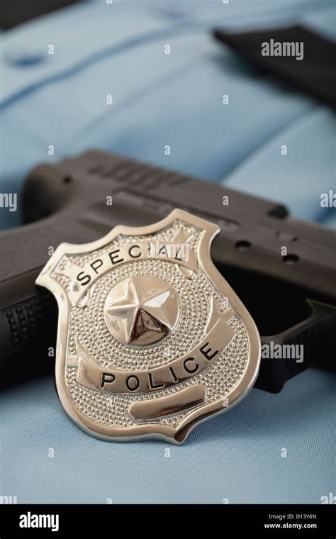 Police Badge And Gun Stock Photo Alamy