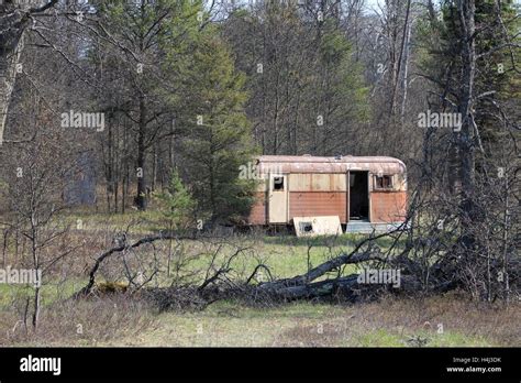 Abandoned Old Trailer In The Woods Stock Photo Alamy