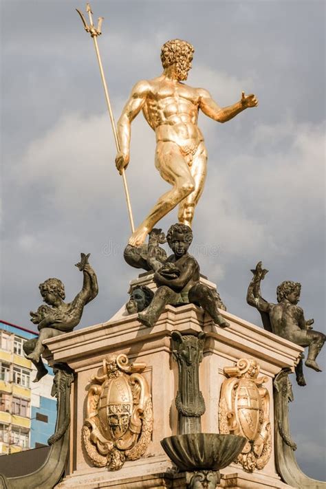 Gold Colored Statue Of Poseidon Or Neptune Editorial Stock Image