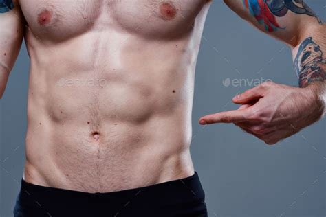 Male Athlete With Cubes On His Stomach Naked Torso Tattoo Bodybuilders Fitness Stock Photo By