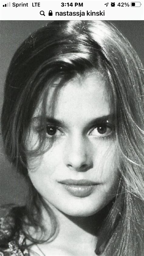 Black And White Photograph Of A Woman With Long Hair