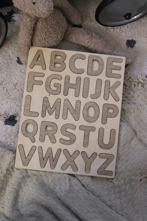 Alphabet Puzzle With Pegs Abc Alphabet Letters Studying Etsy