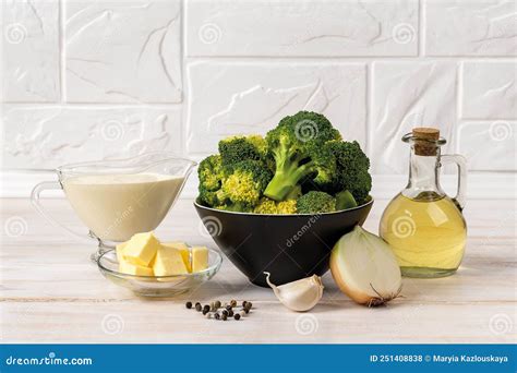 Cream Of Broccoli Soup Raw Ingredients On The Countertop Puree Soup Recipe Of Broccoli Florets