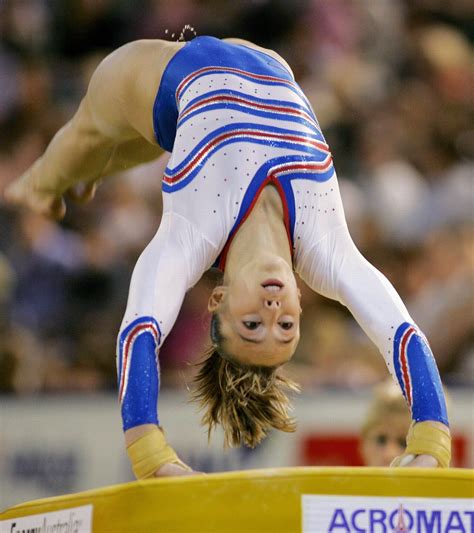 Emilie Le Pennec of France goes through her routine on the vault in the