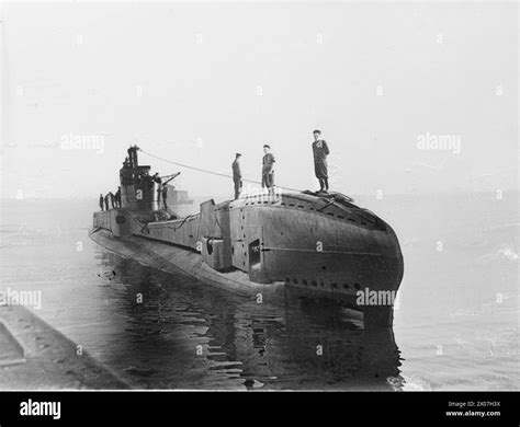 HM SUBMARINE THUNDERBOLT FORMERLY HMS THETIS ON HER RETURN TO HARBOUR