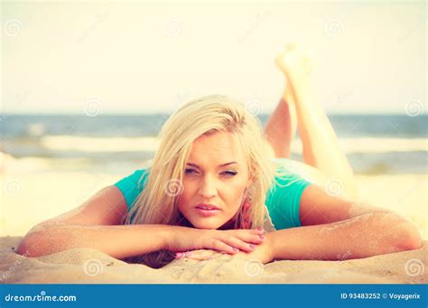 Woman Lying On Sandy Beach Relaxing During Summer Stock Photo Image Of Blonde Attractive