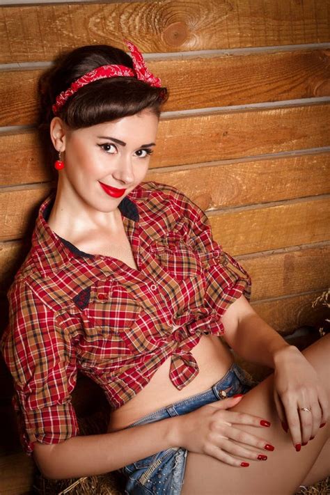Portrait Of Smiling Beautiful Brunette Pin Up Woman Wearing Headband