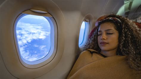 how to sleep on a long flight