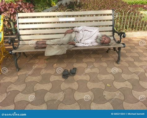 Old Man Sleeping On Bench Editorial Image 68531504