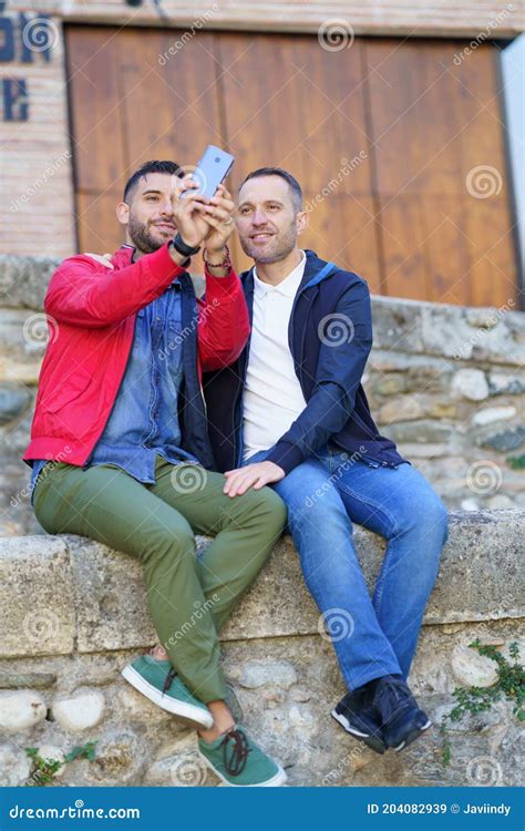 Gay Couple Making A Selfie With Their Smartphone Stock Image Image Of Device Cheerful