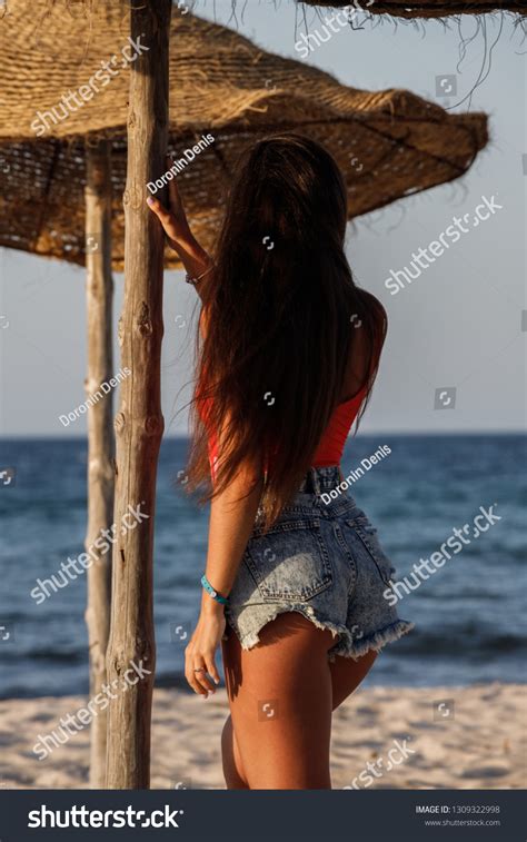 Beautiful Sexy Brunette Girl Denim Shorts Stock Photo