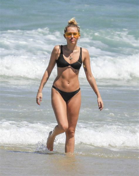 Miley Cyrus In Black Bikini At The Beach In Byron Bay Australia January Celebs Today